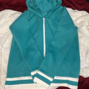 Teal zip-up sweater, super soft on the inside and comfortable! 10/10.